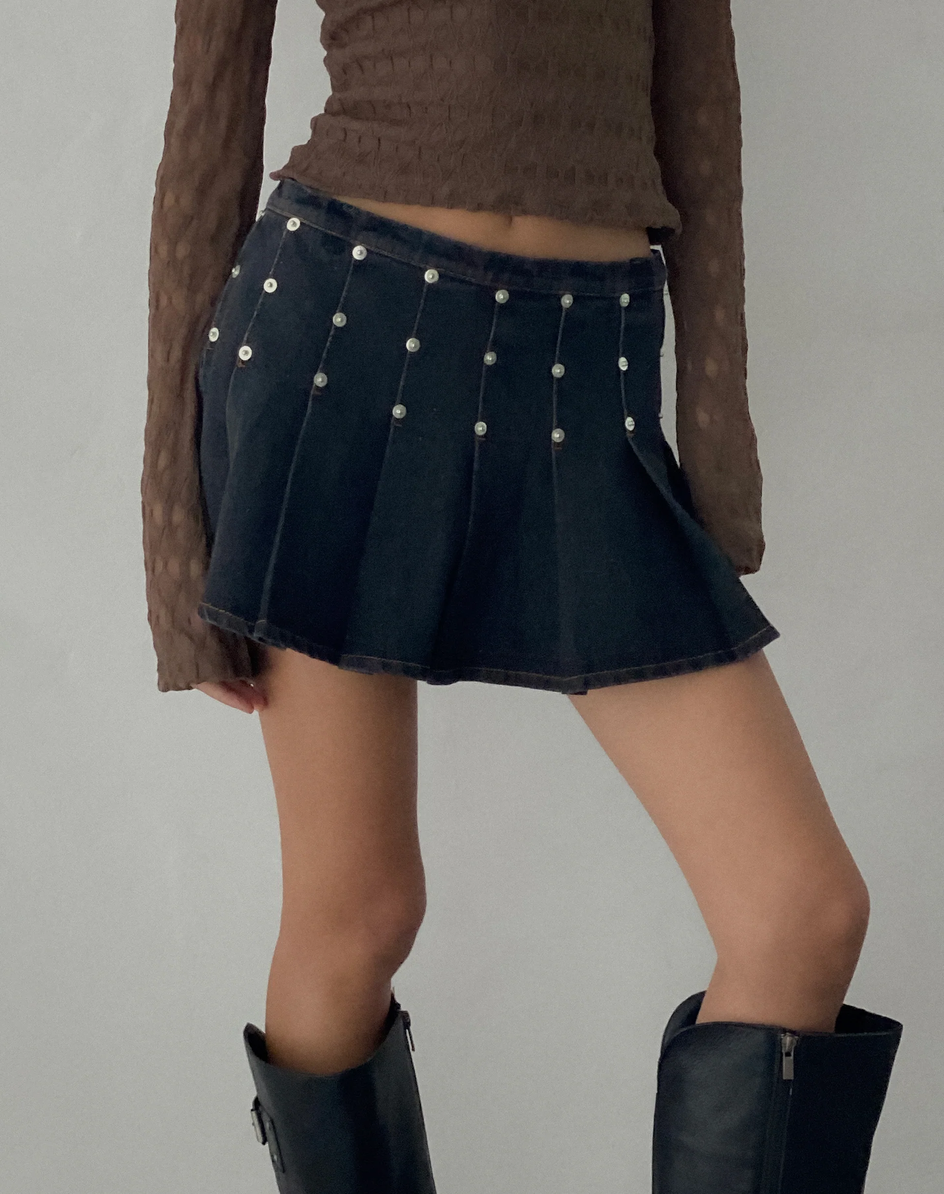 Gatlin Pleated Denim Mini Skirt in Black Wash with Studs - Awmao