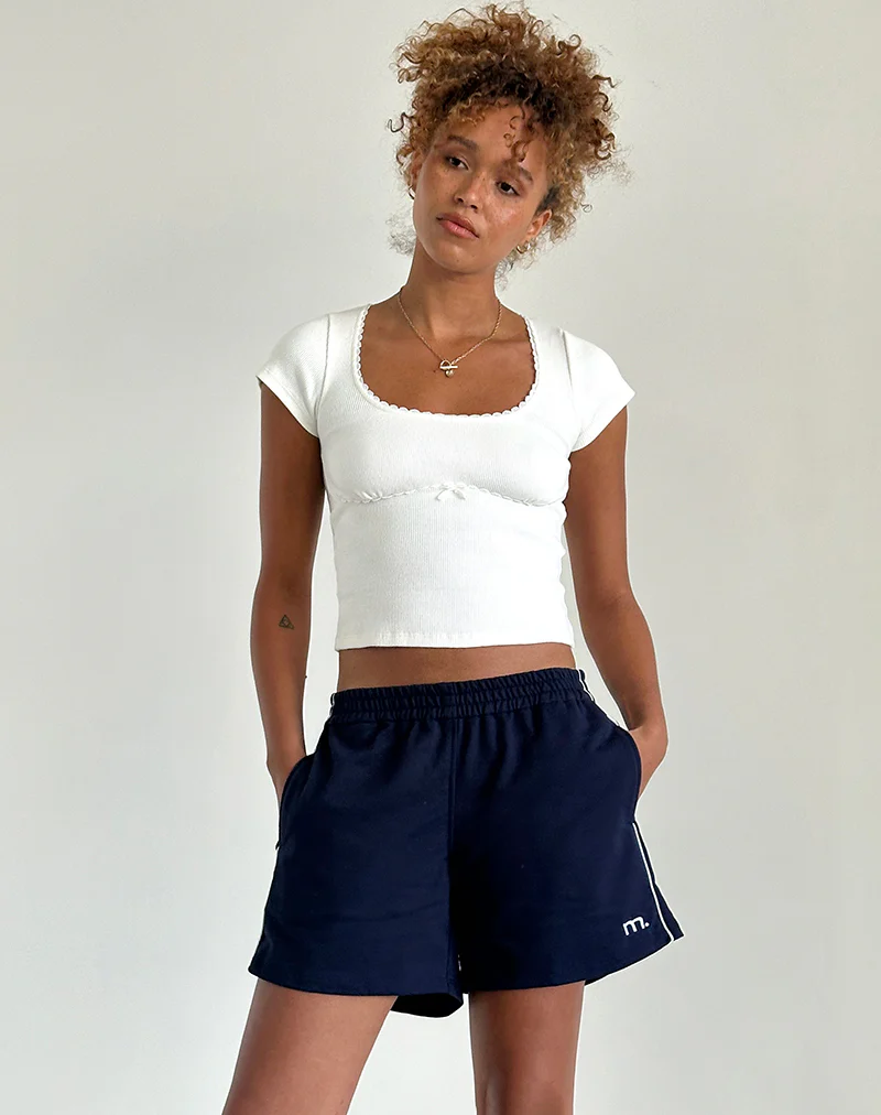 Thera Short in Navy with White Piping with M Emb - Awmao